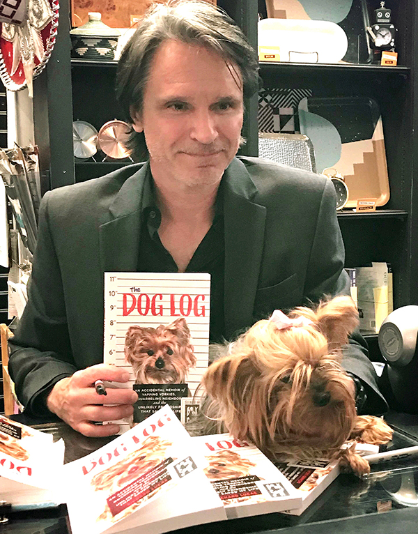 Richard Lucas, author of The Dog Log, signing books after reading at West Hollywood's Book Soup